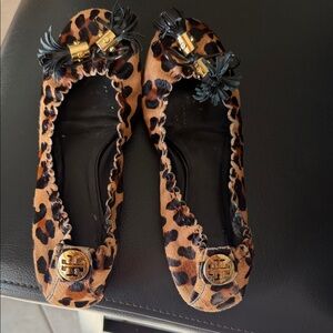 Tory Burch Animal Print Flats with Tassel Detail